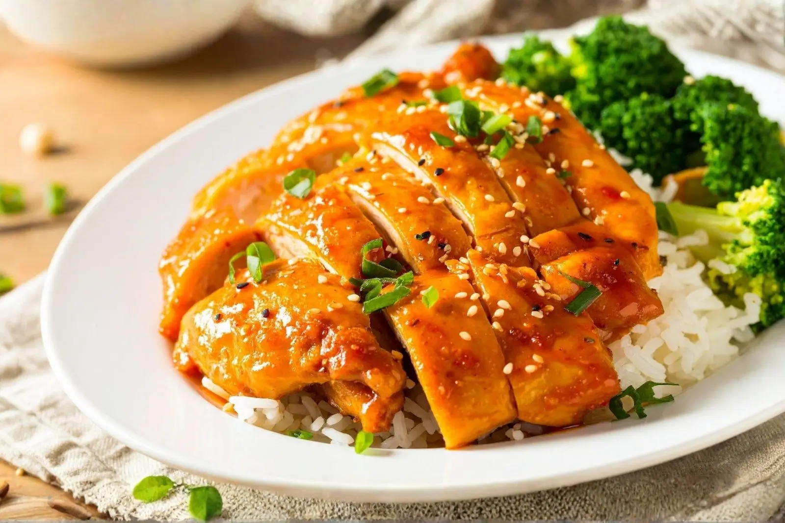 Glazed chicken slices served with rice and broccoli at Umai, a Asian Fusion Restaurant in Keizer